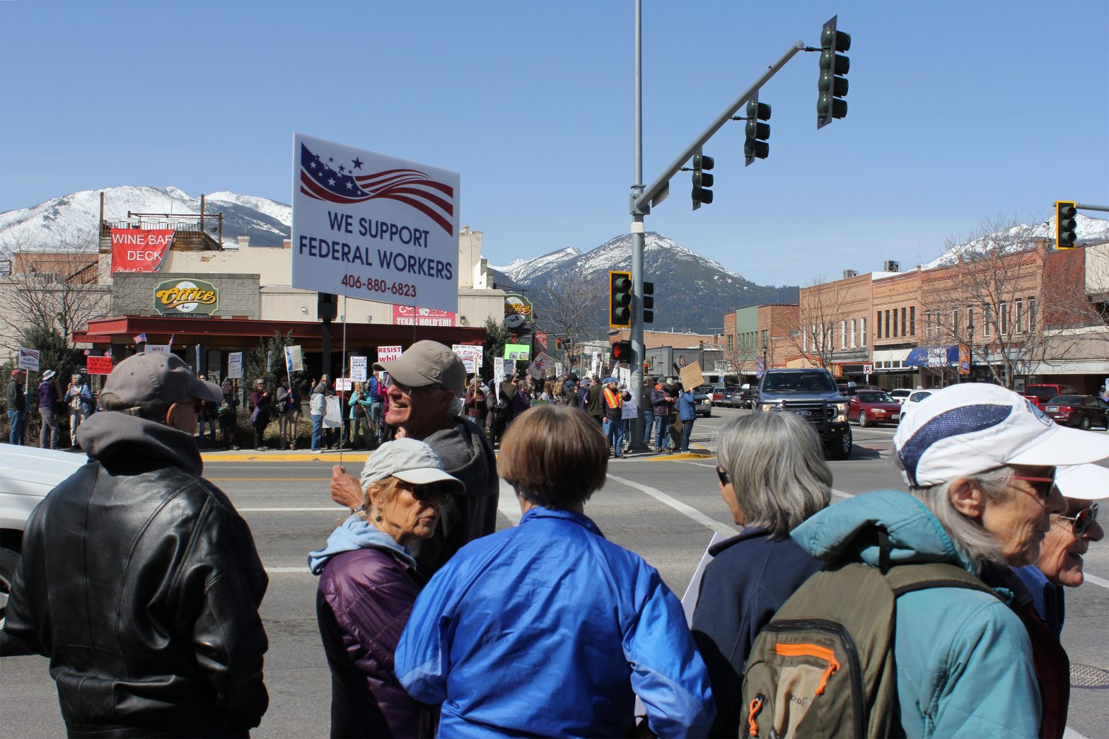 A photo of a crowd of protesters marching in a Montana town.